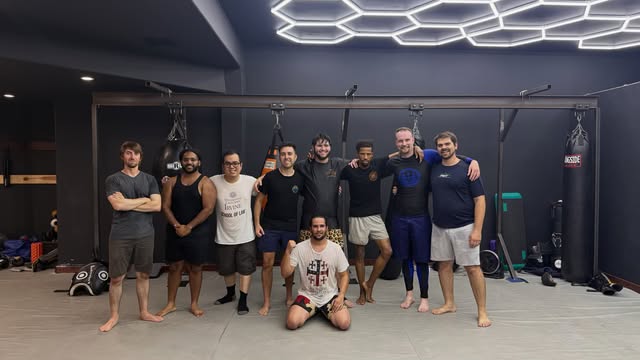 The Sit.Silom BJJ class lined up on the mats after training